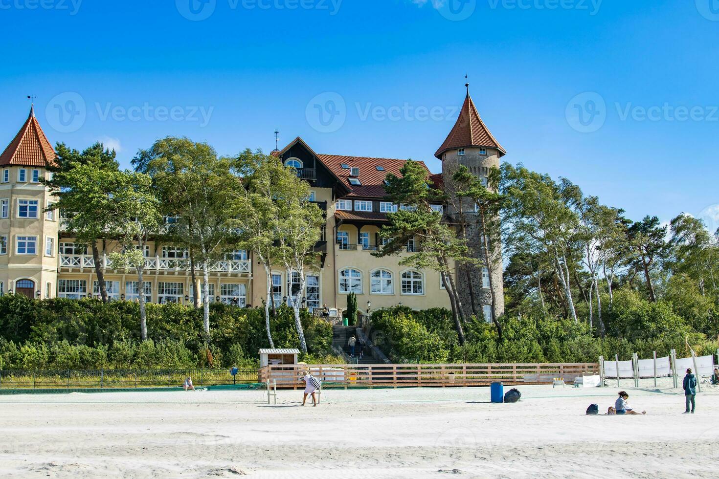 historic hotel on the beach in leba in Poland on a sunny summer day photo