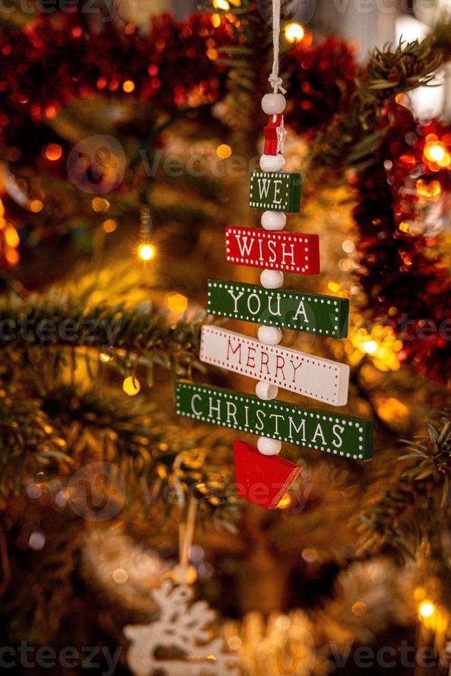 decorations for the holidays on a green Christmas tree in close-up photo