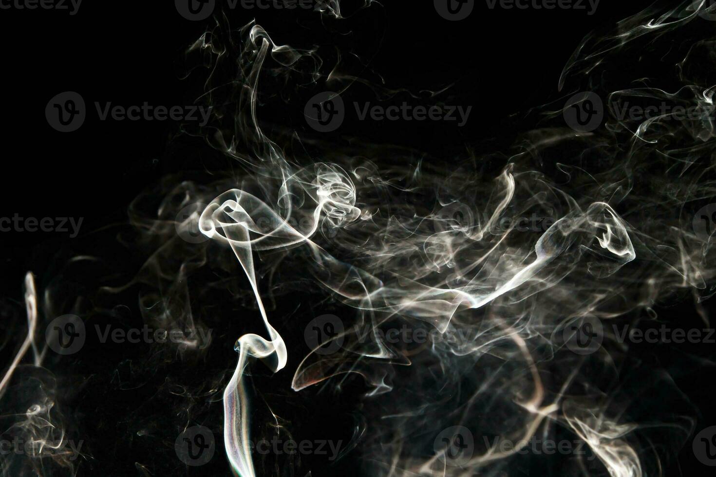 Smoke effect texture. Isolated background. Black and dark backdrop. Smokey fire and mistic effect. photo