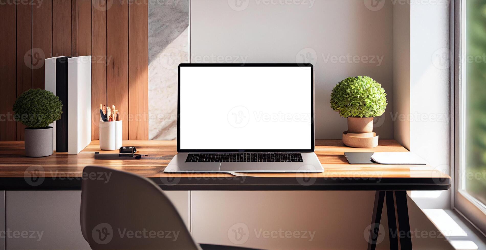 Modern workspace with blank screen laptop, white frame - image photo