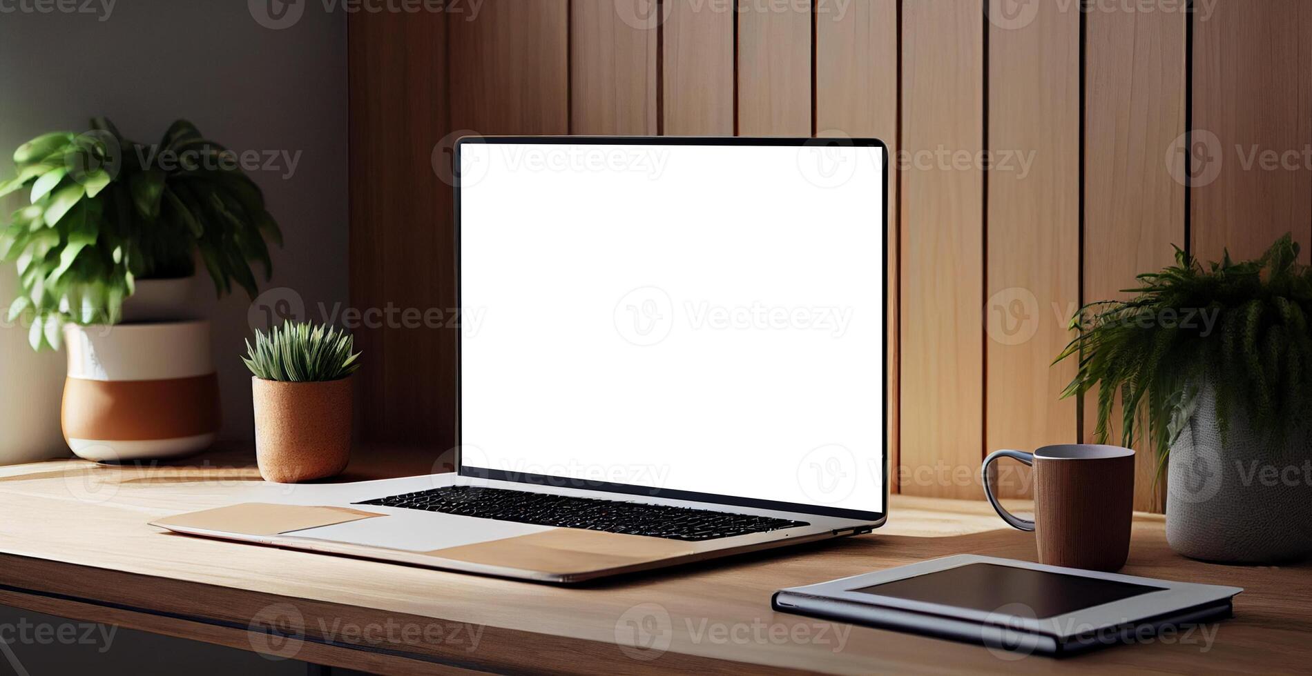 Modern workspace with blank screen laptop, white frame - image photo