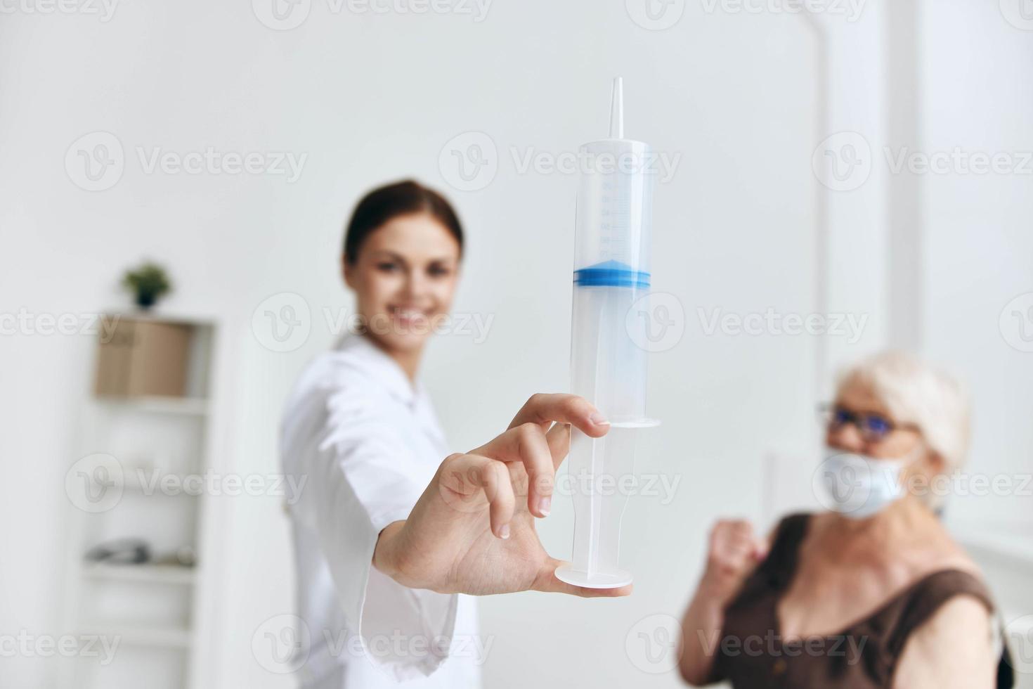 emotional nurse and patient hand injection fun photo