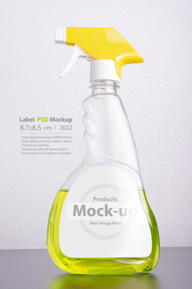 Cleaning liquid bottle in front of  light gray background psd