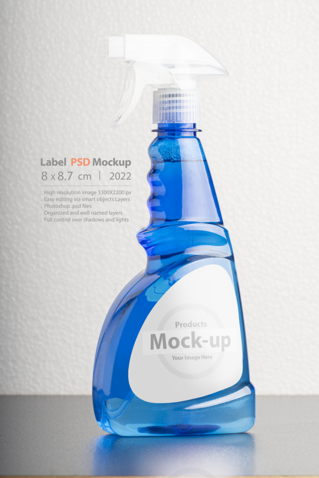 Cleaning liquid bottle in front of  light gray background psd