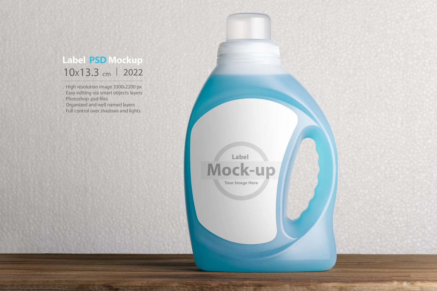 Cloth detergent liquid bottle on wooden board psd