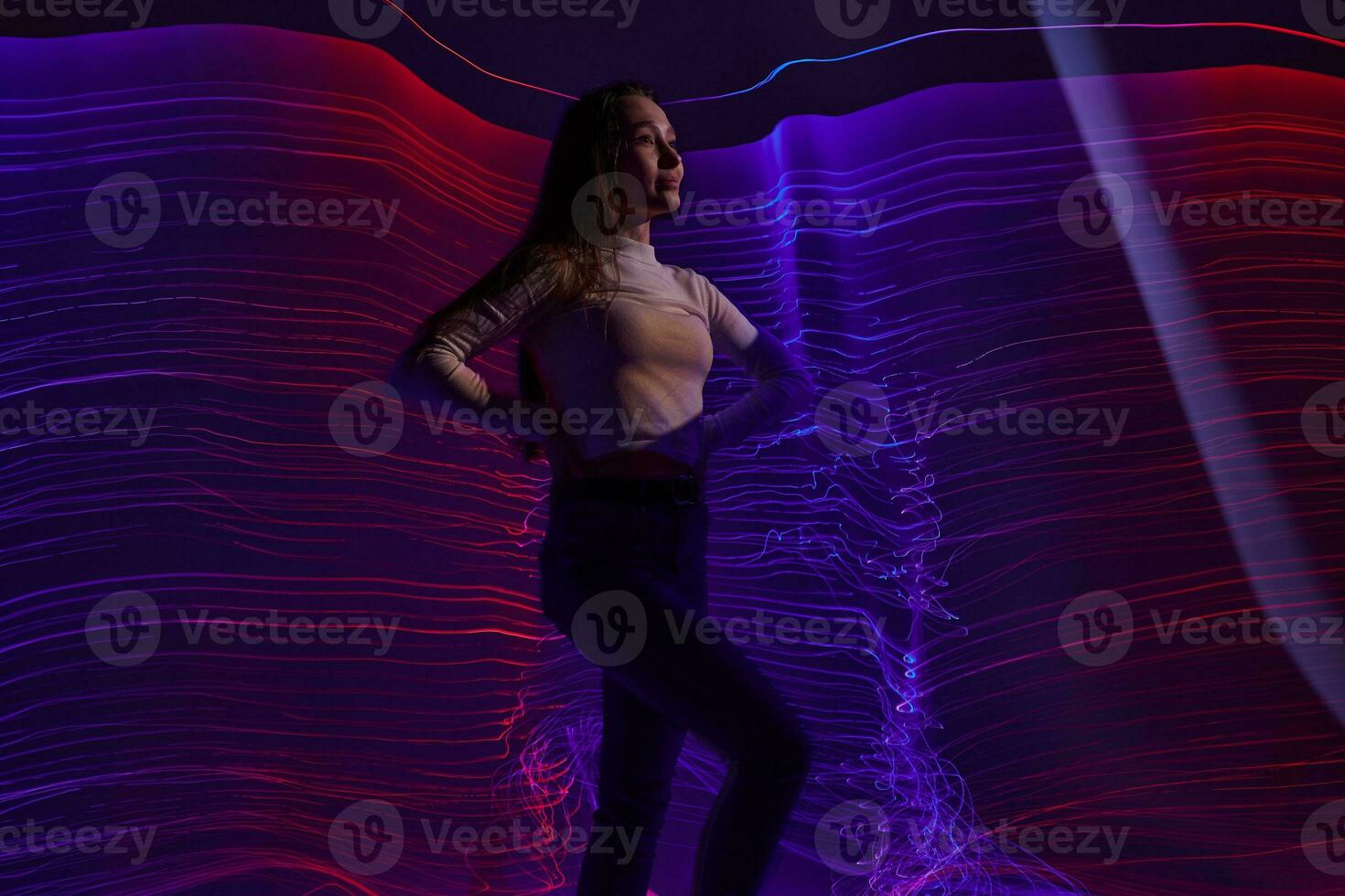 Positive young woman disco neon lines luxury fashion studio model unaltered photo