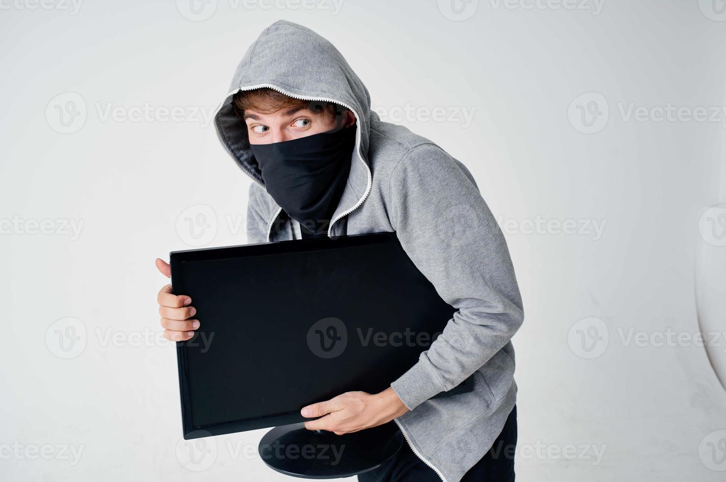 male thief hooded head hacking technology security isolated background photo
