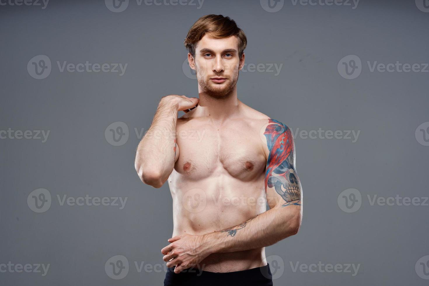 sexy guy tattooed athlete bodybuilder fitness muscular torso photo