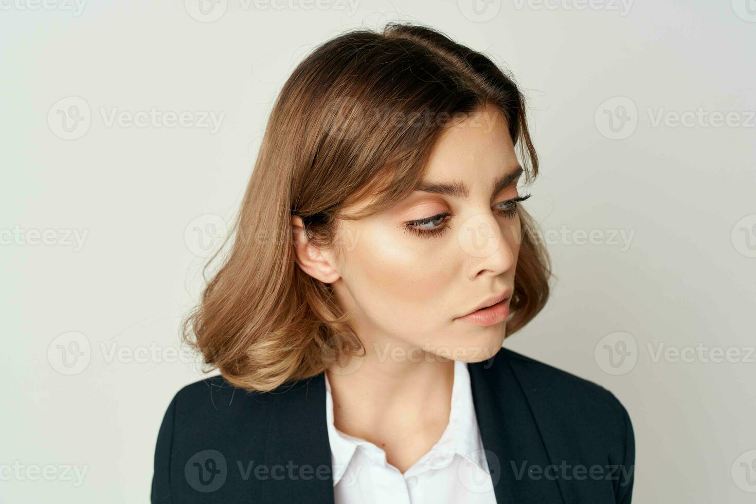 cheerful woman in suit work documents office manager posing photo