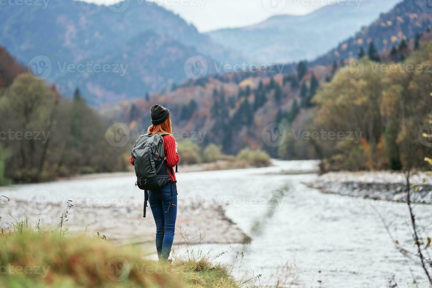 woman travel tourism mountains landscape lake river autumn photo