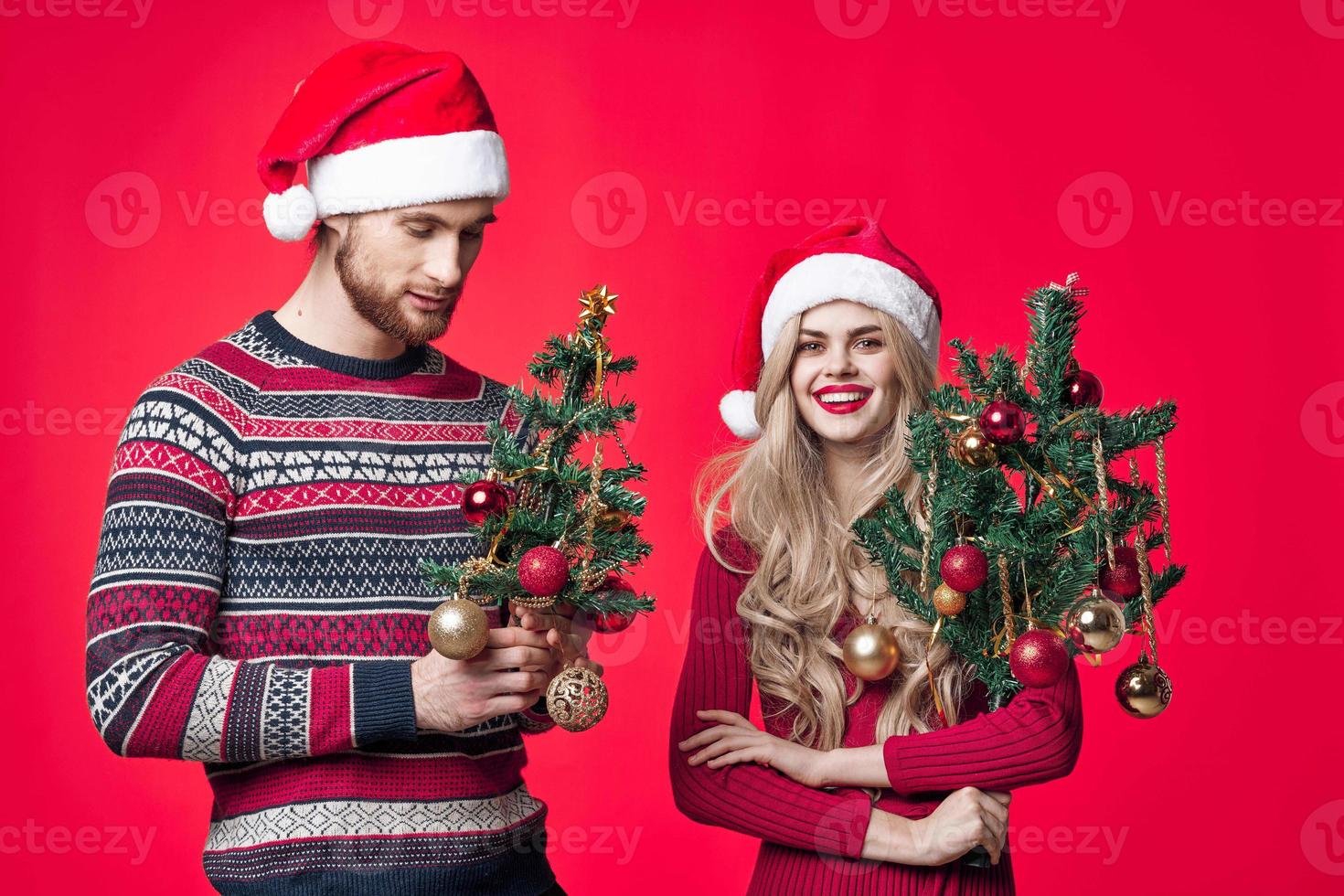 young couple holiday fun joy christmas decoration photo
