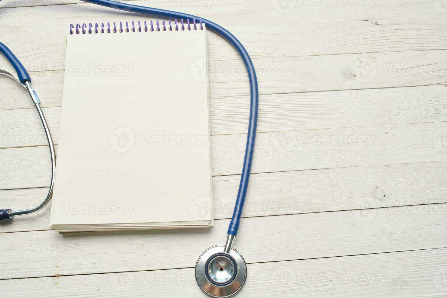 stethoscope with notepad hospital health care photo