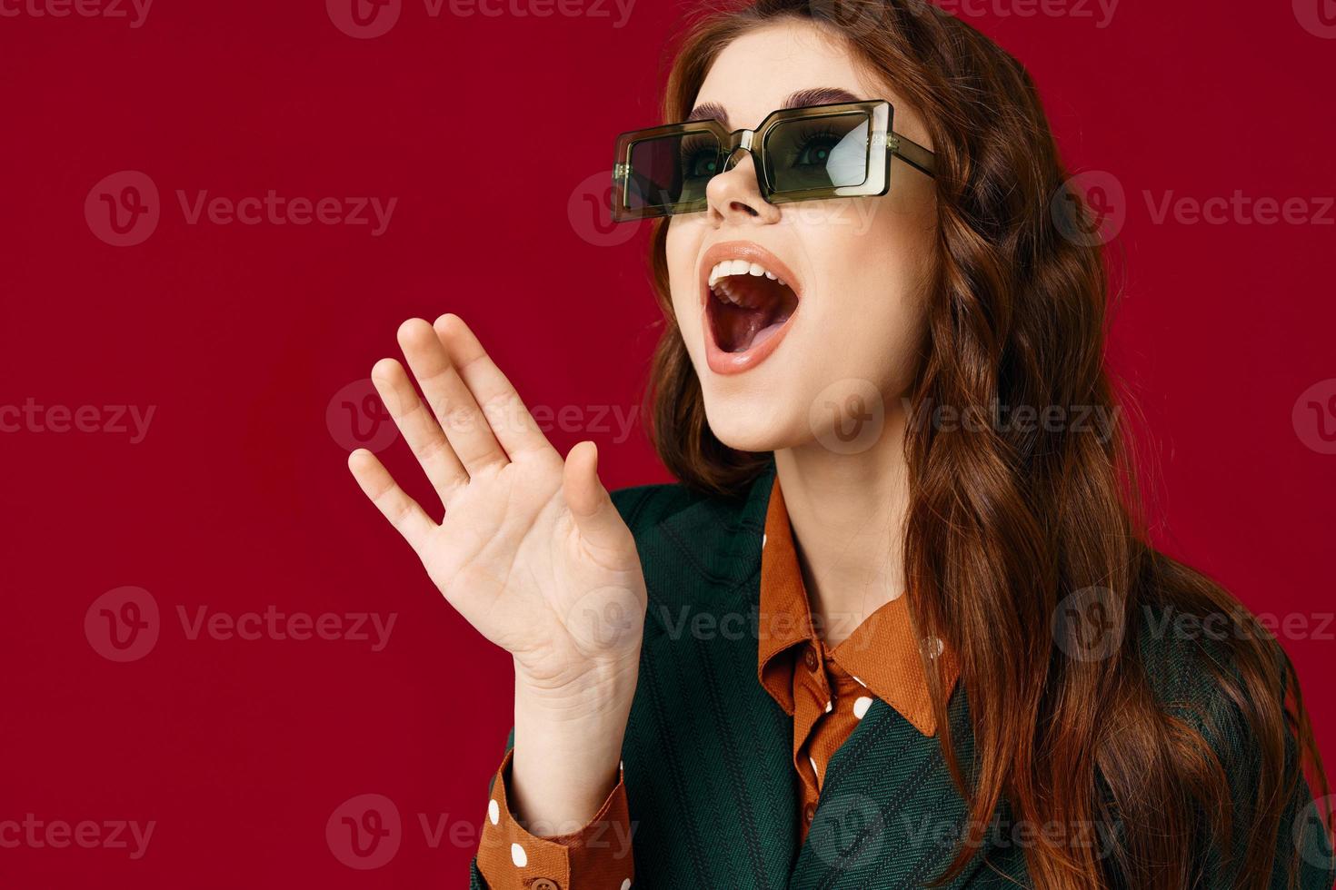 woman with open mouth wearing sunglasses emotions surprise cropped view photo