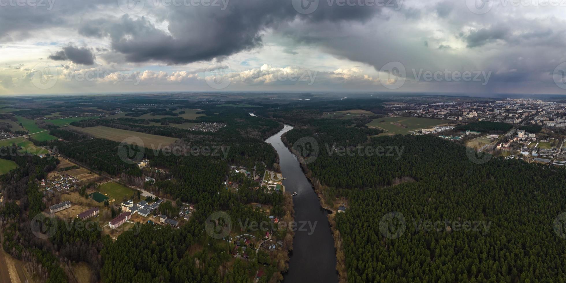 panoramic view from a high altitude of a meandering river in the forest photo