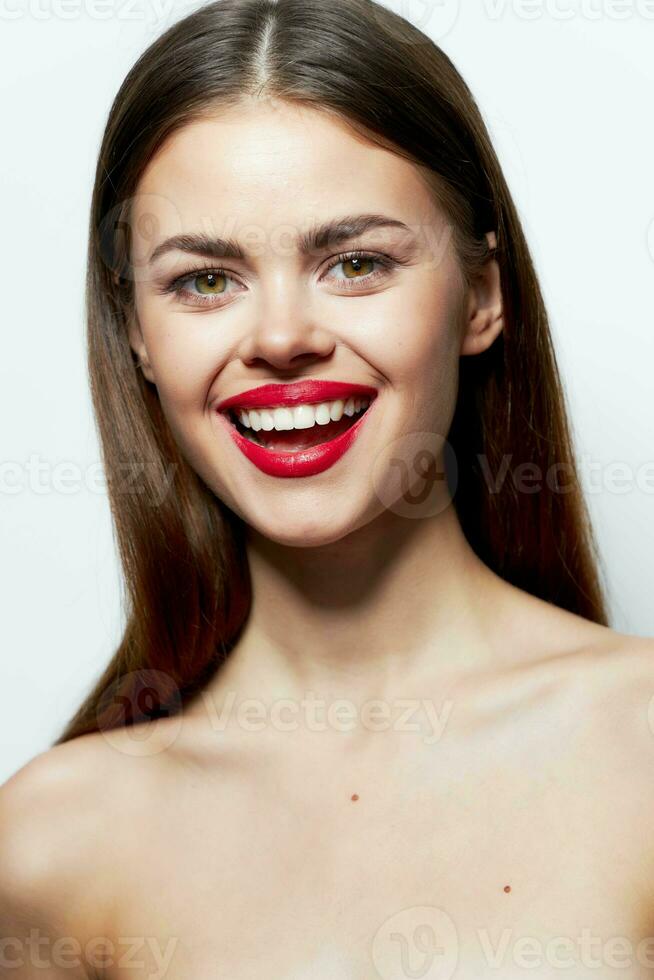 Charming woman Clear skin smile red lips fun spa treatments photo
