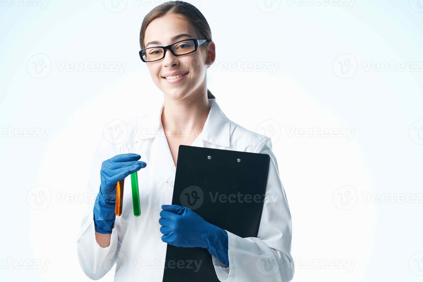 Woman in white coat laboratory research analysis science photo