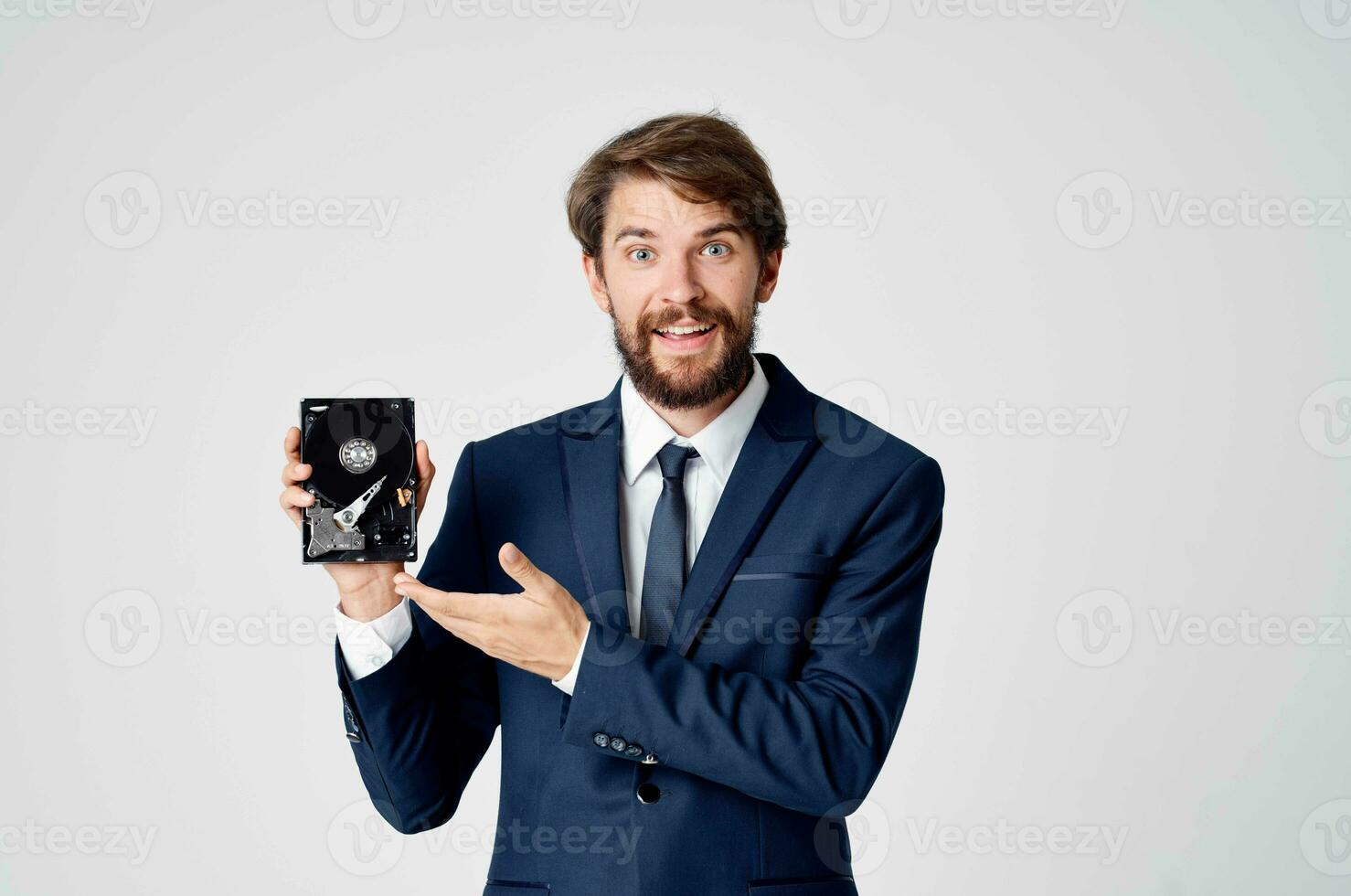 business man in suit hard drive technology information photo