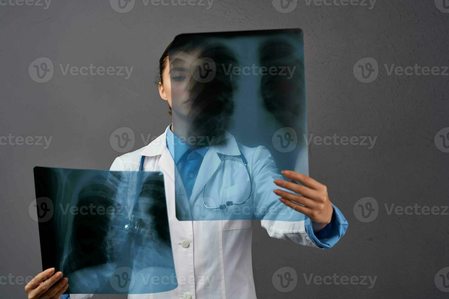 female doctor in white coat diagnostics x-ray hospital professional photo