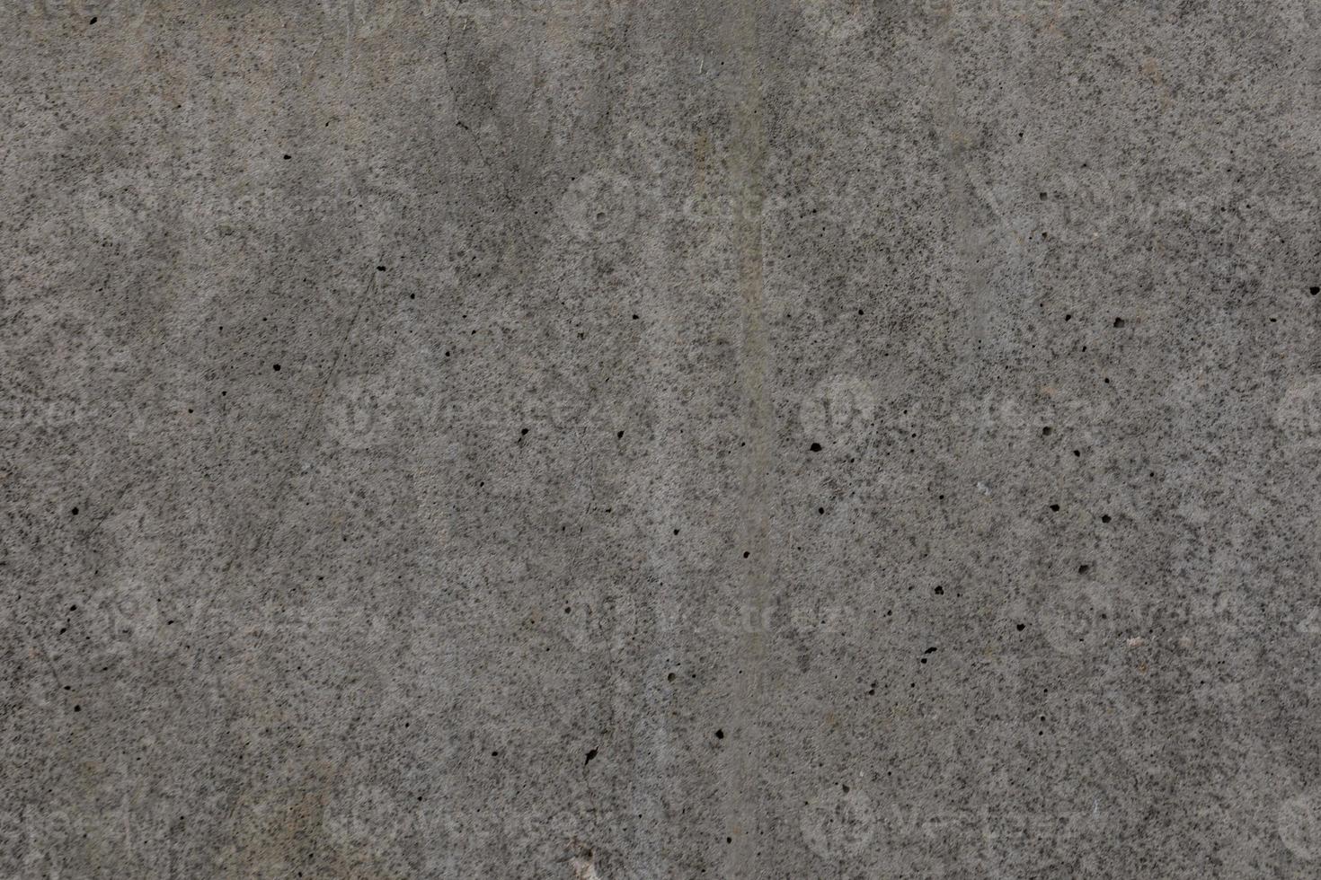 interesting industrial gray concrete background in closeup photo