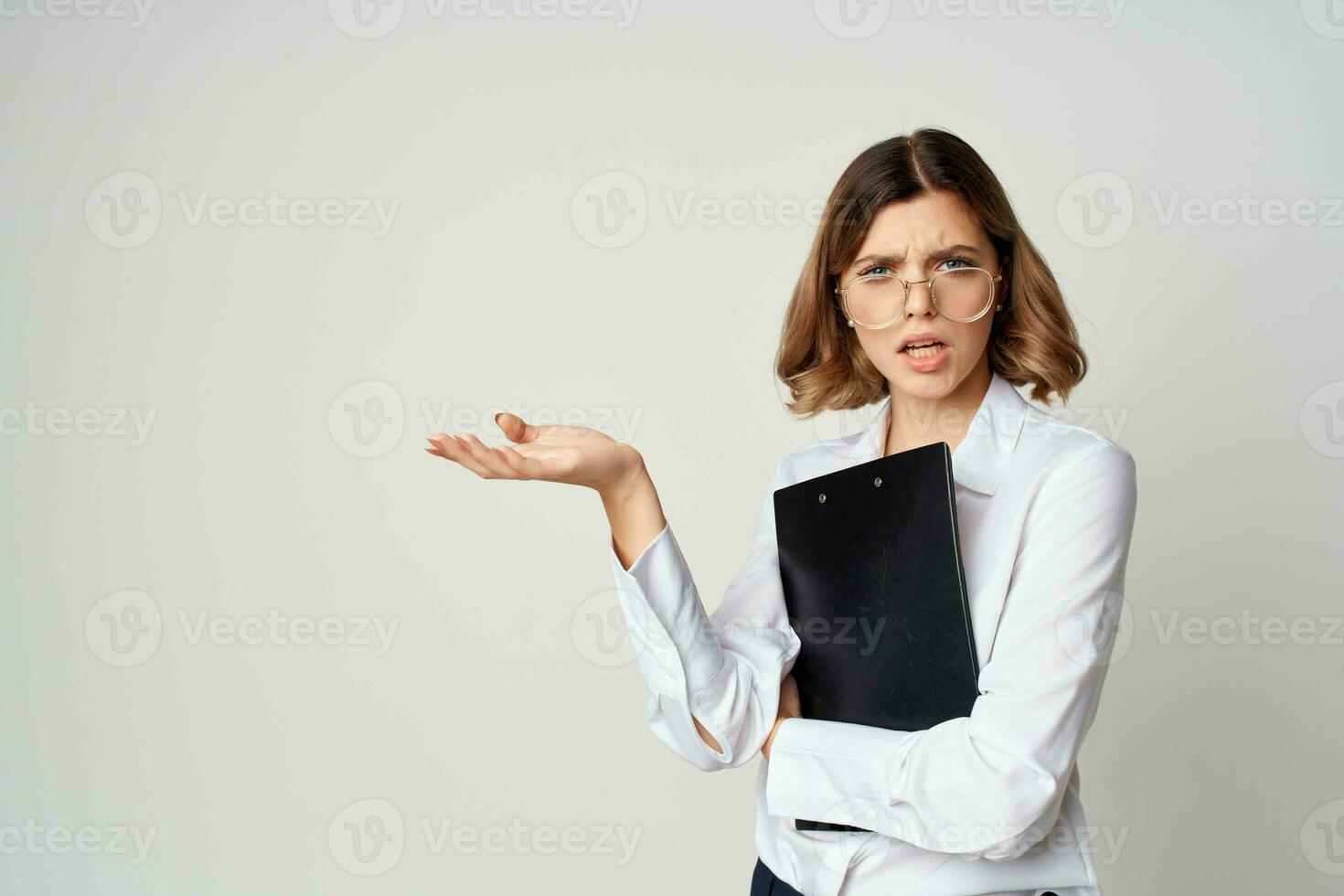 Business woman in white shirt documents office manager photo