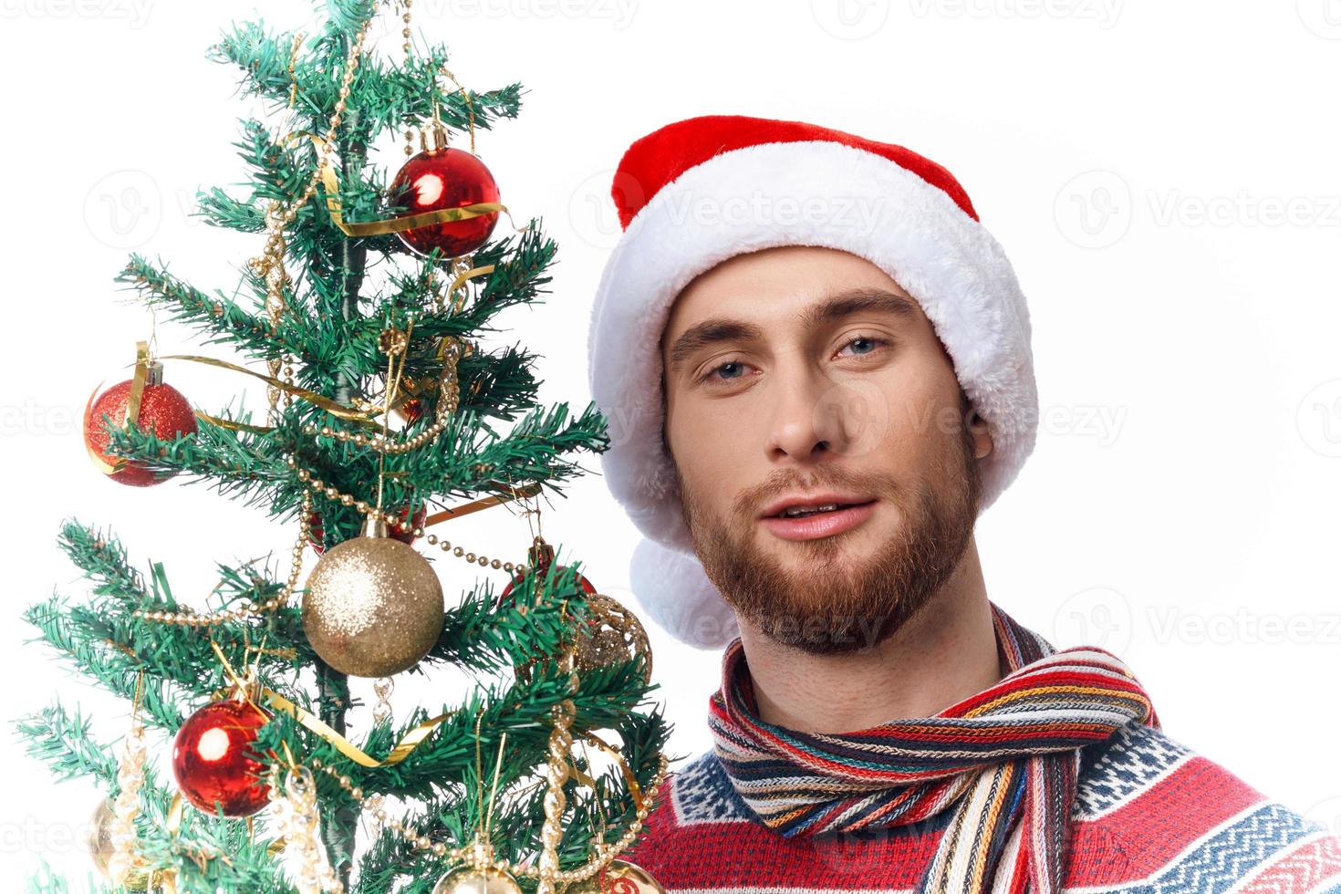 emotional man in New Year's clothes decoration christmas studio posing photo