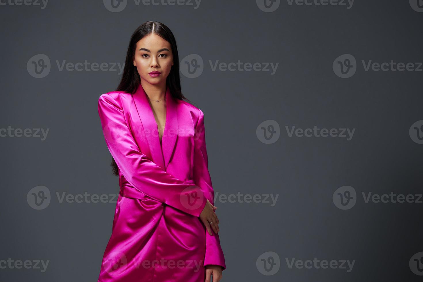 young woman in a pink mini dress luxury isolated background photo