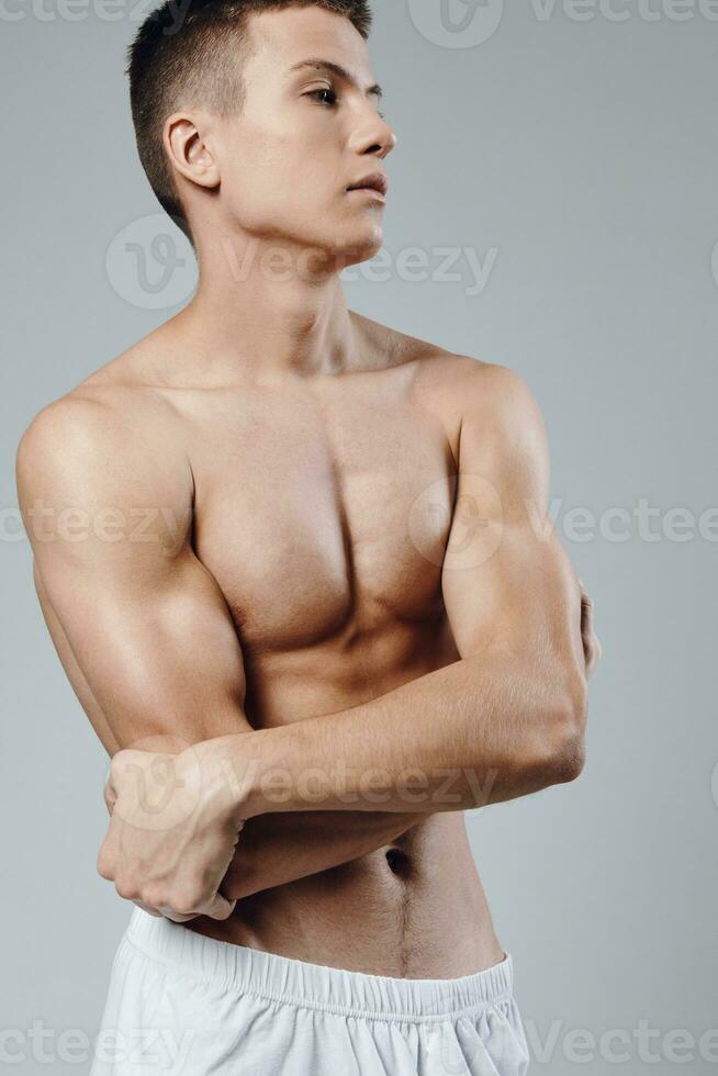 sexy athlete with pumped muscles bodybuilder fitness biceps model photo