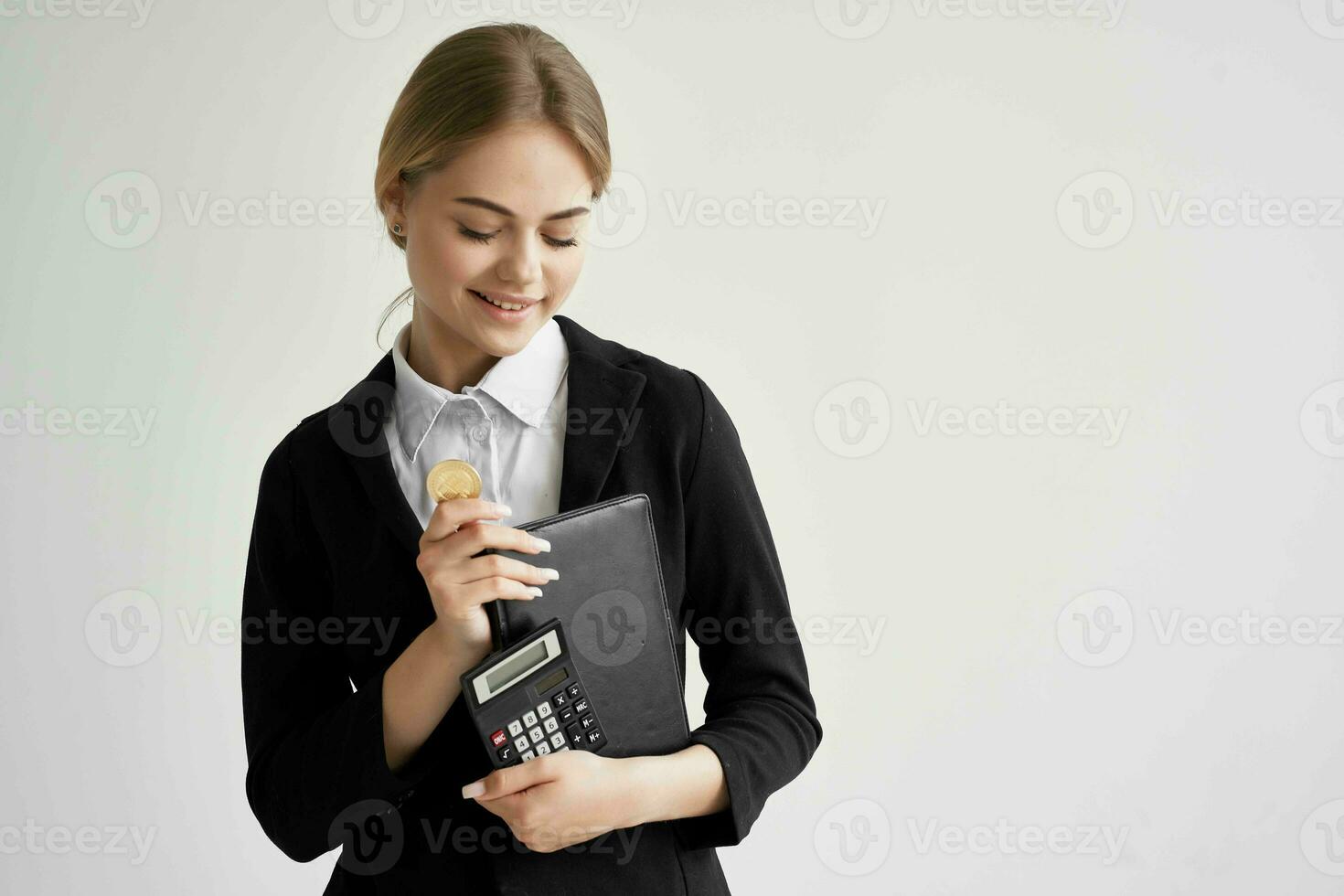 cheerful woman Bitcoin cryptocurrency in hands isolated background photo