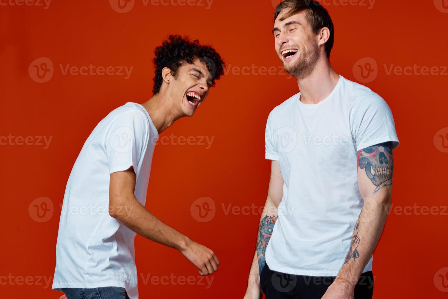 two friends in white t-shirts construction teams he emotions photo