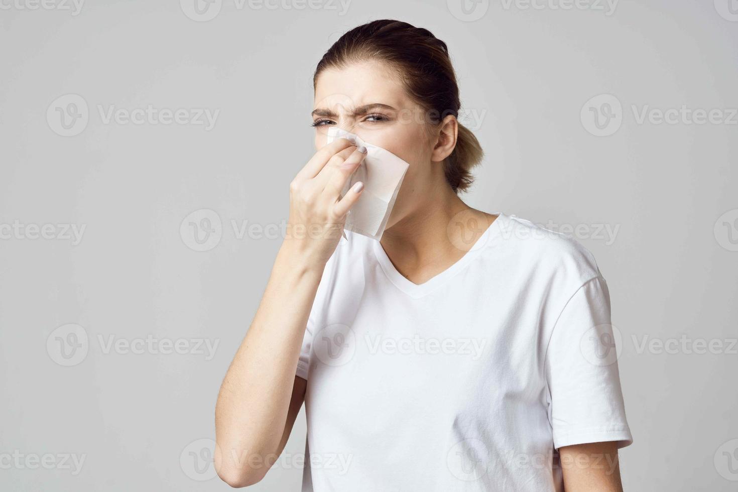 woman in white t-shirt handkerchief cold health problems photo