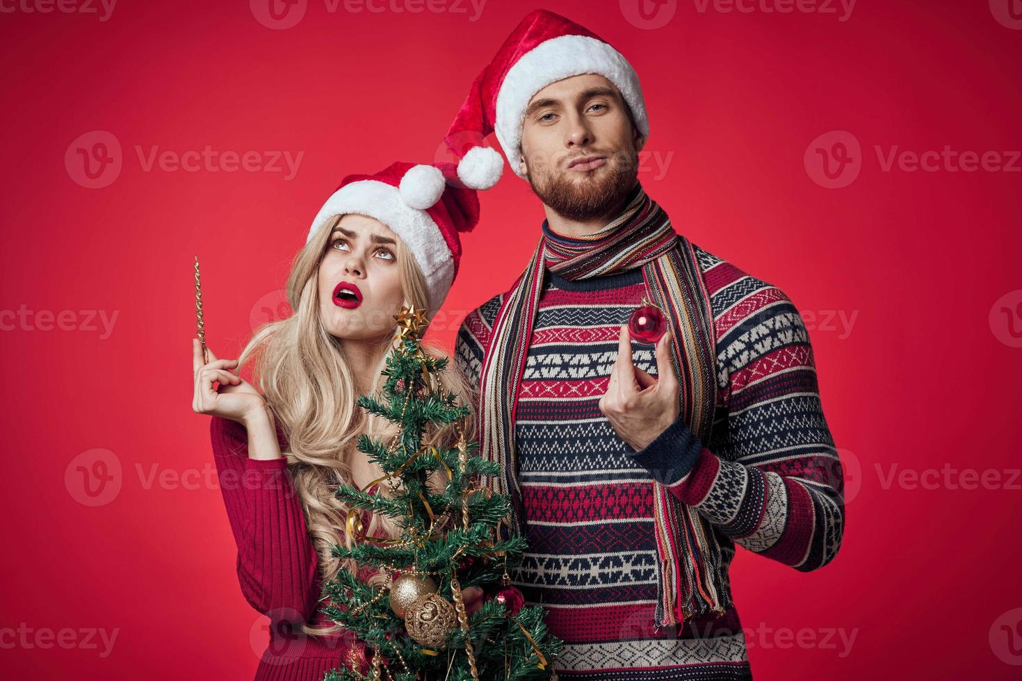 man and woman stand side by side emotions holiday romance christmas photo