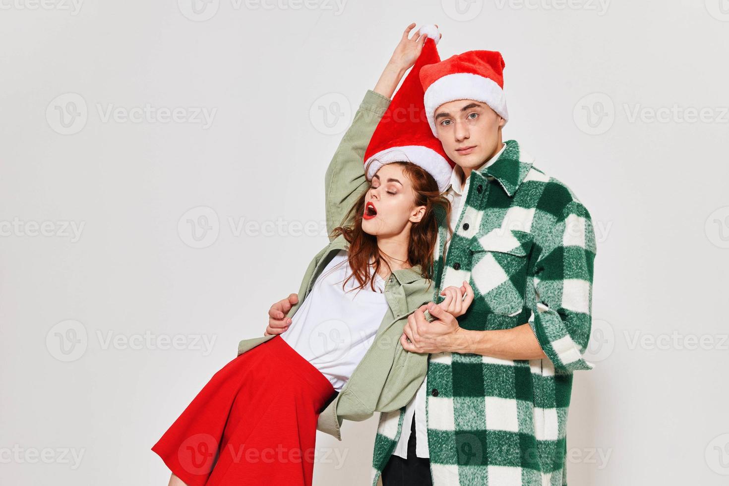 Cute young couple new year clothes attractive look holiday fun photo