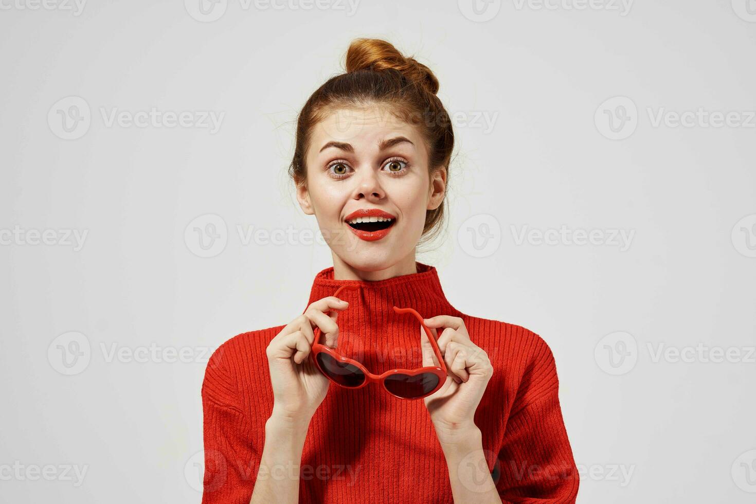 fashionable woman in a red sweater isolated background photo