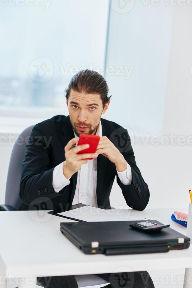 manager at the desk documents communication by phone Lifestyle photo