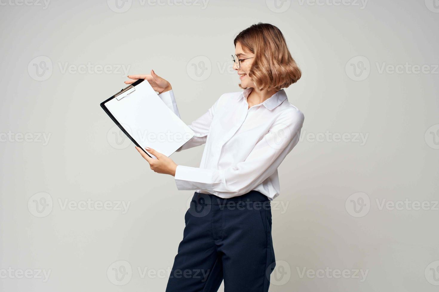 woman manager in suit documents official work photo