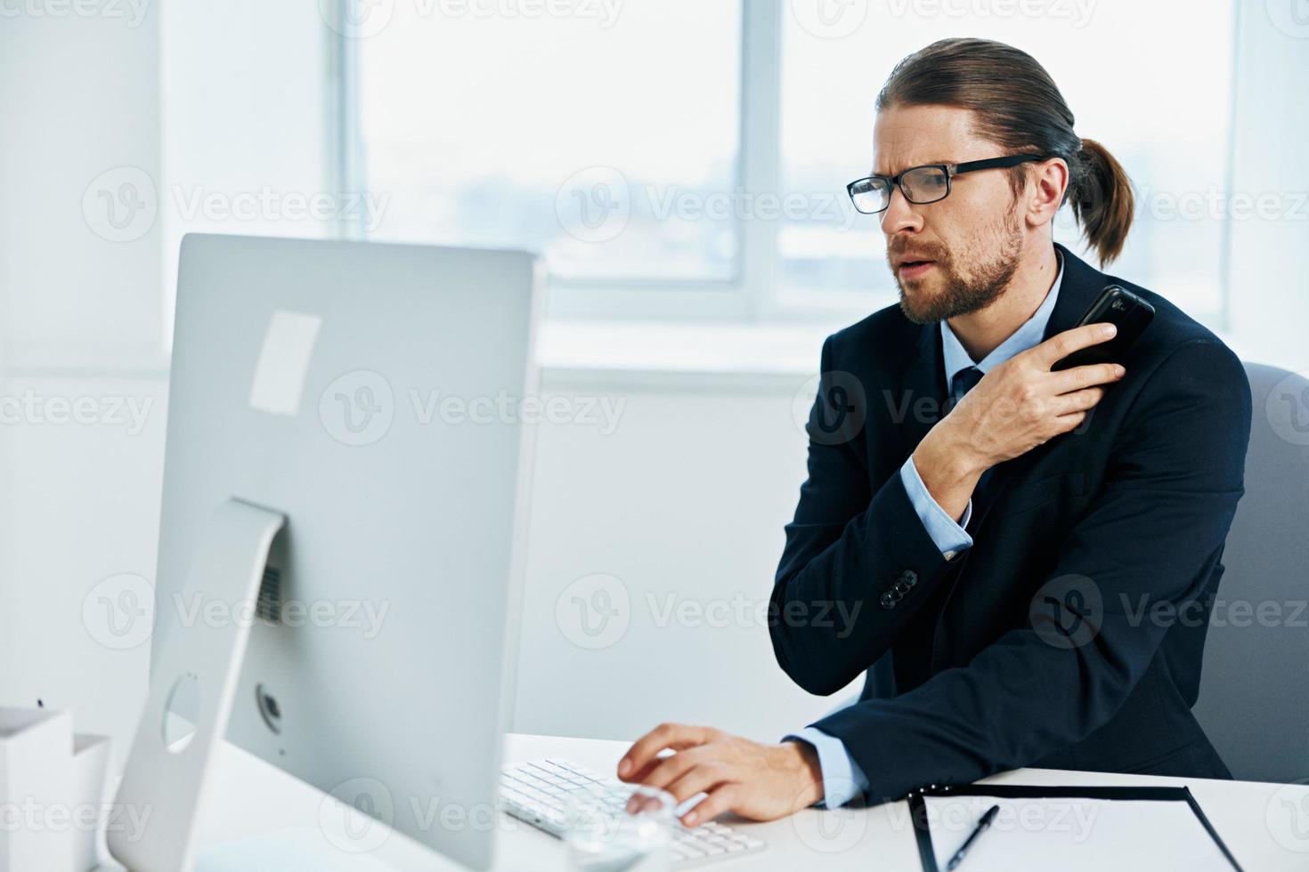 The man in a suit with glasses self-confidence work boss photo