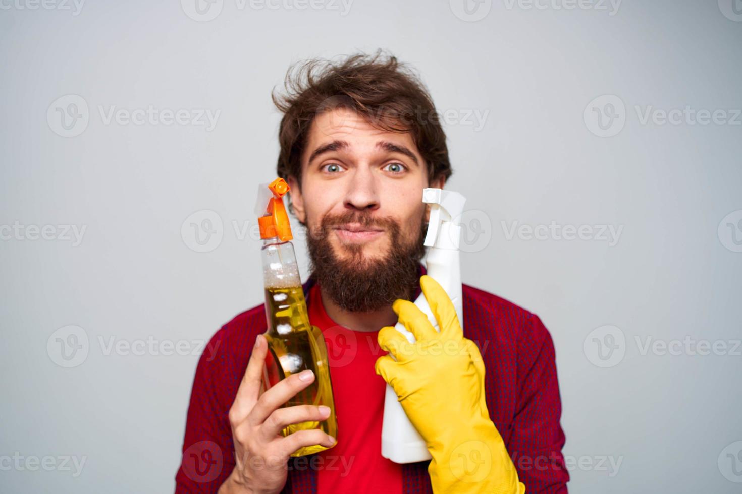 emotional man cleaning service lifestyle detergent cropped view photo