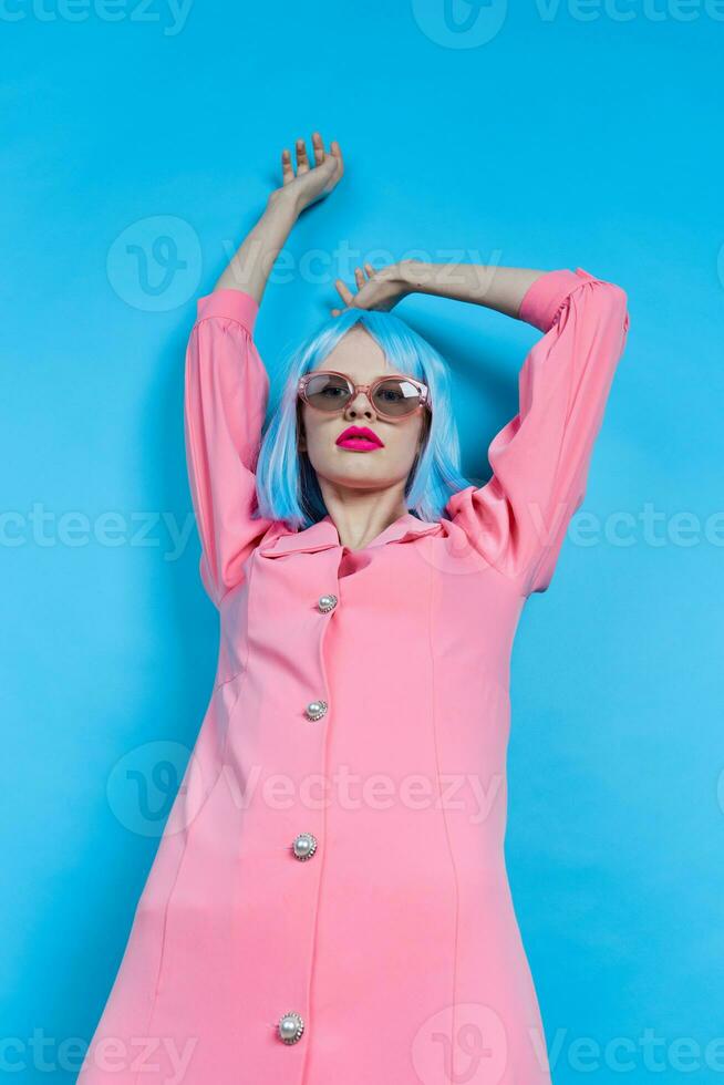 glamorous woman in sunglasses wears a blue wig makeup Lifestyle posing photo