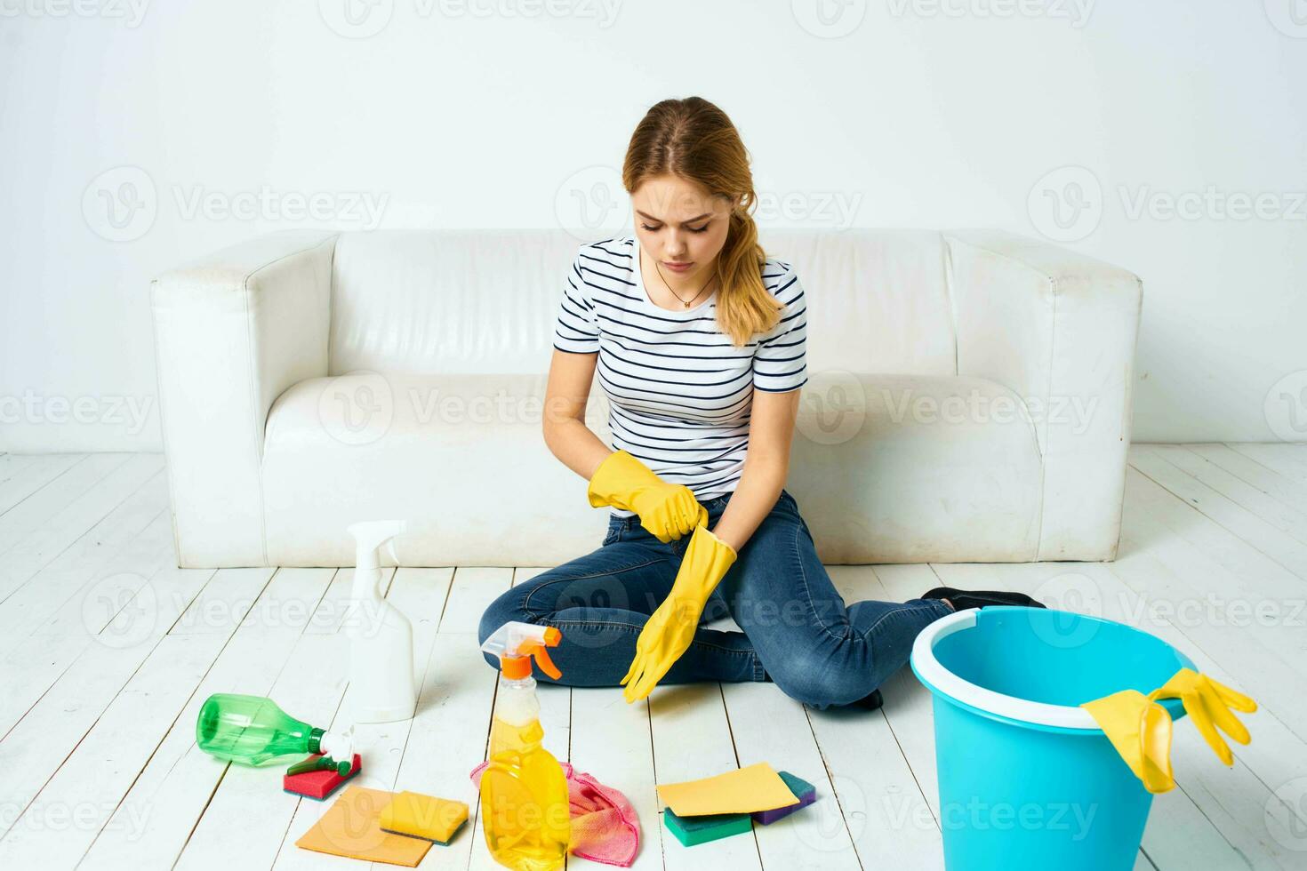 Woman cleaning room cleaning hygiene and interior detergent service photo