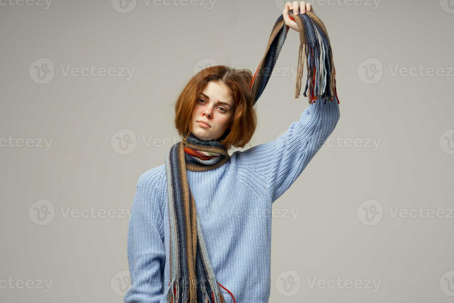 sick woman neck scarf cold handkerchief light background photo