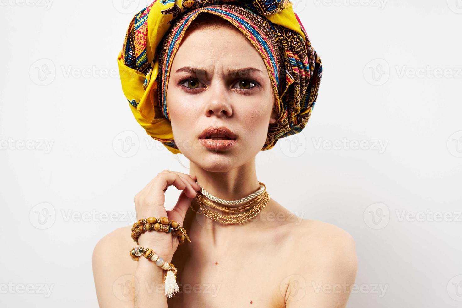 woman in multicolored turban decoration cosmetics makeup fun photo