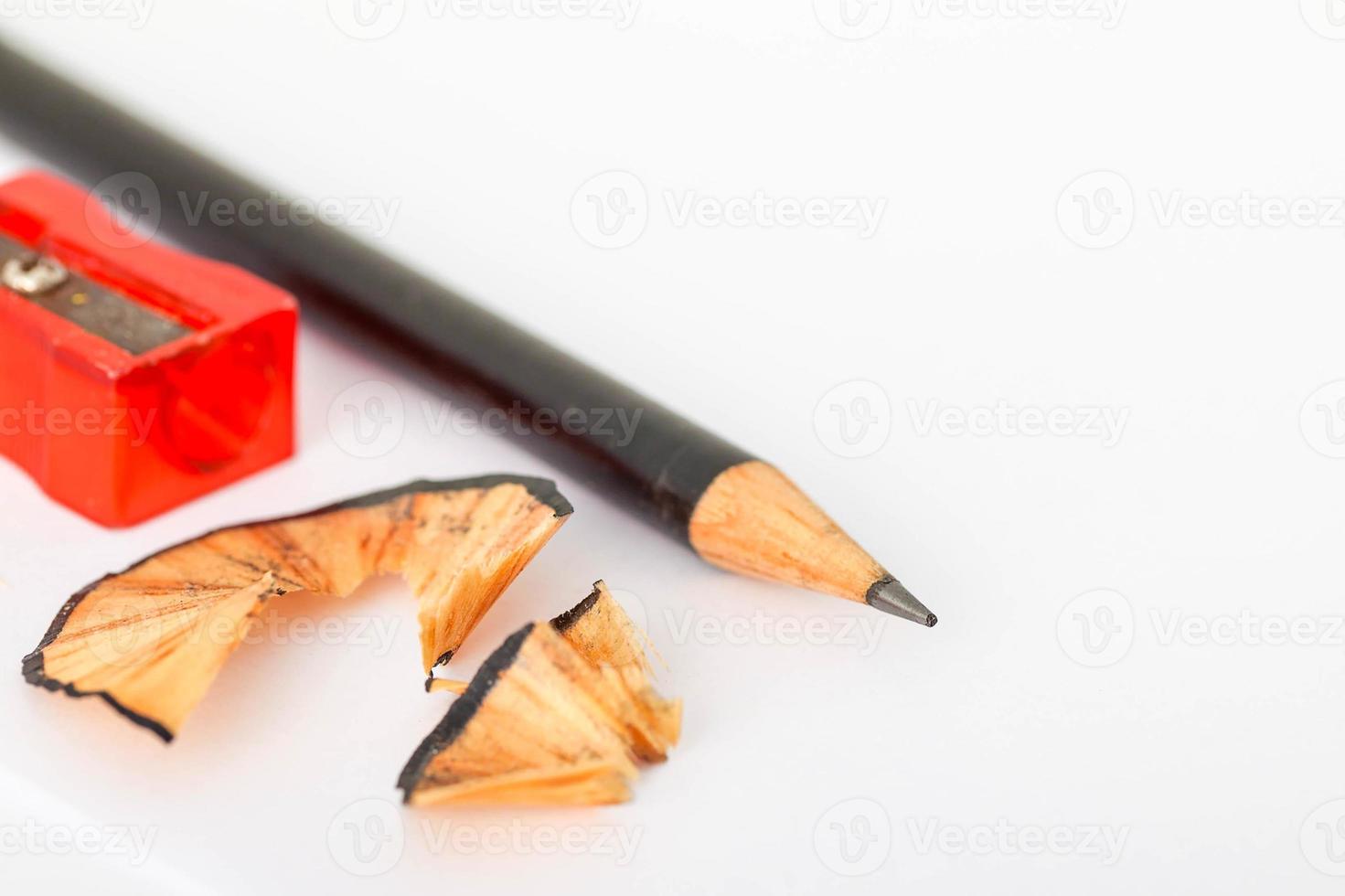 Pencils, eraser school image and back classes - Pencil, eraser and pointed on a sheet of notebook photo