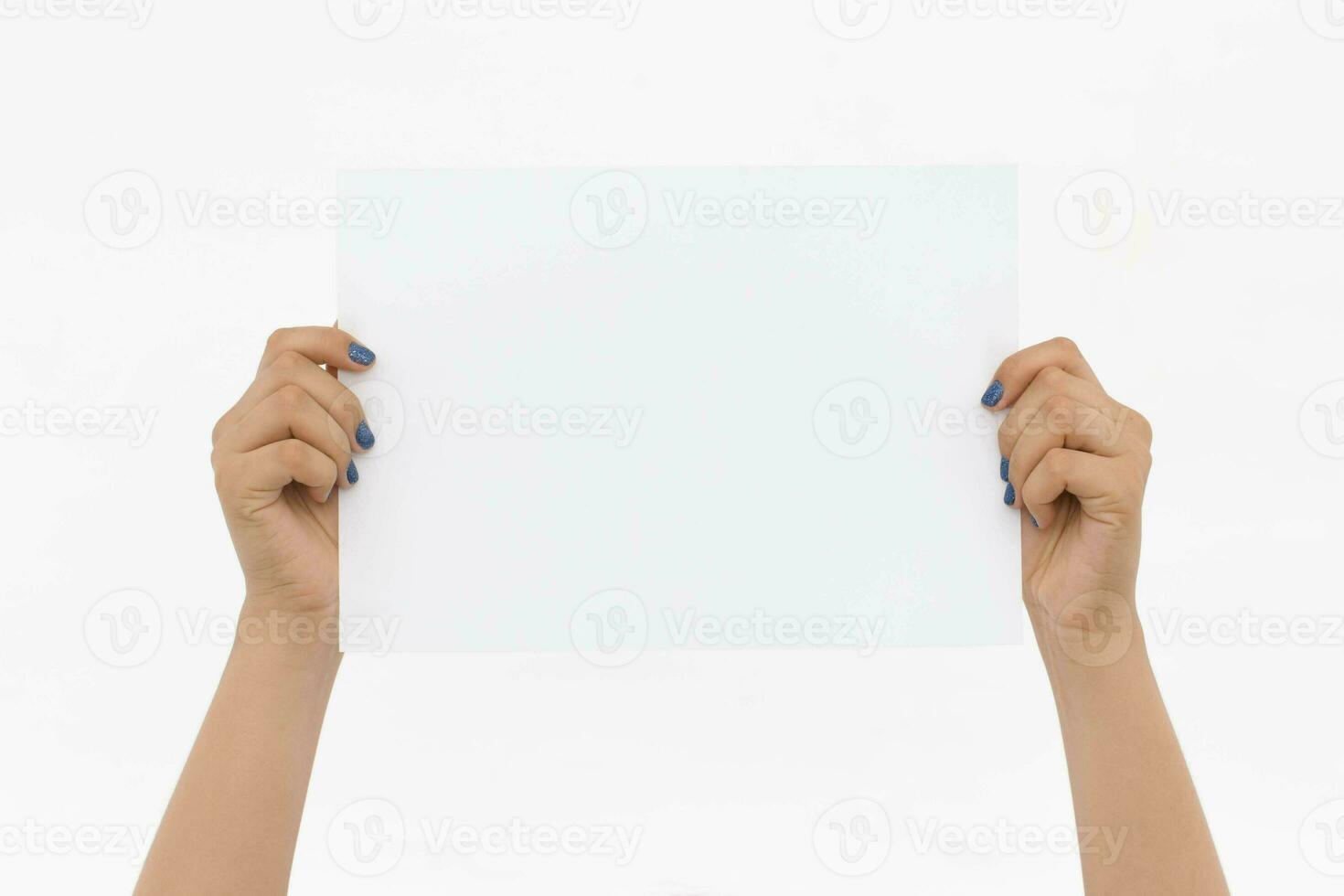 Hands Holding White Paper Sheet photo