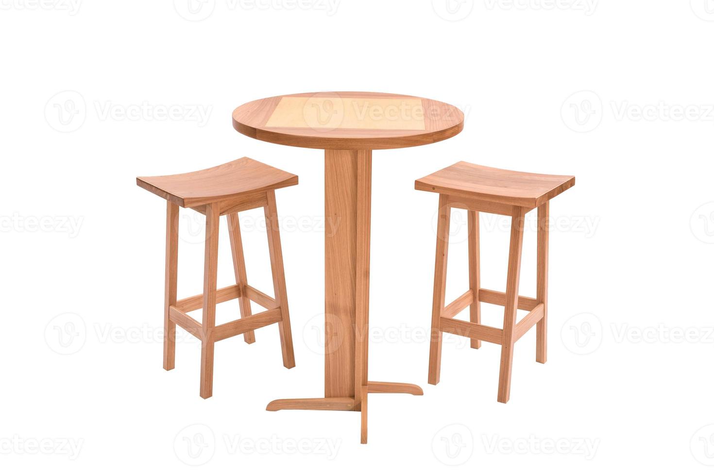 Outdoor wooden dining table with two stools photo