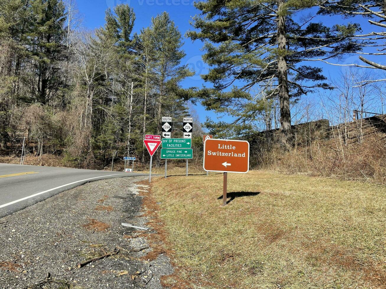 Mountain scenery valley waterfall road signs photo