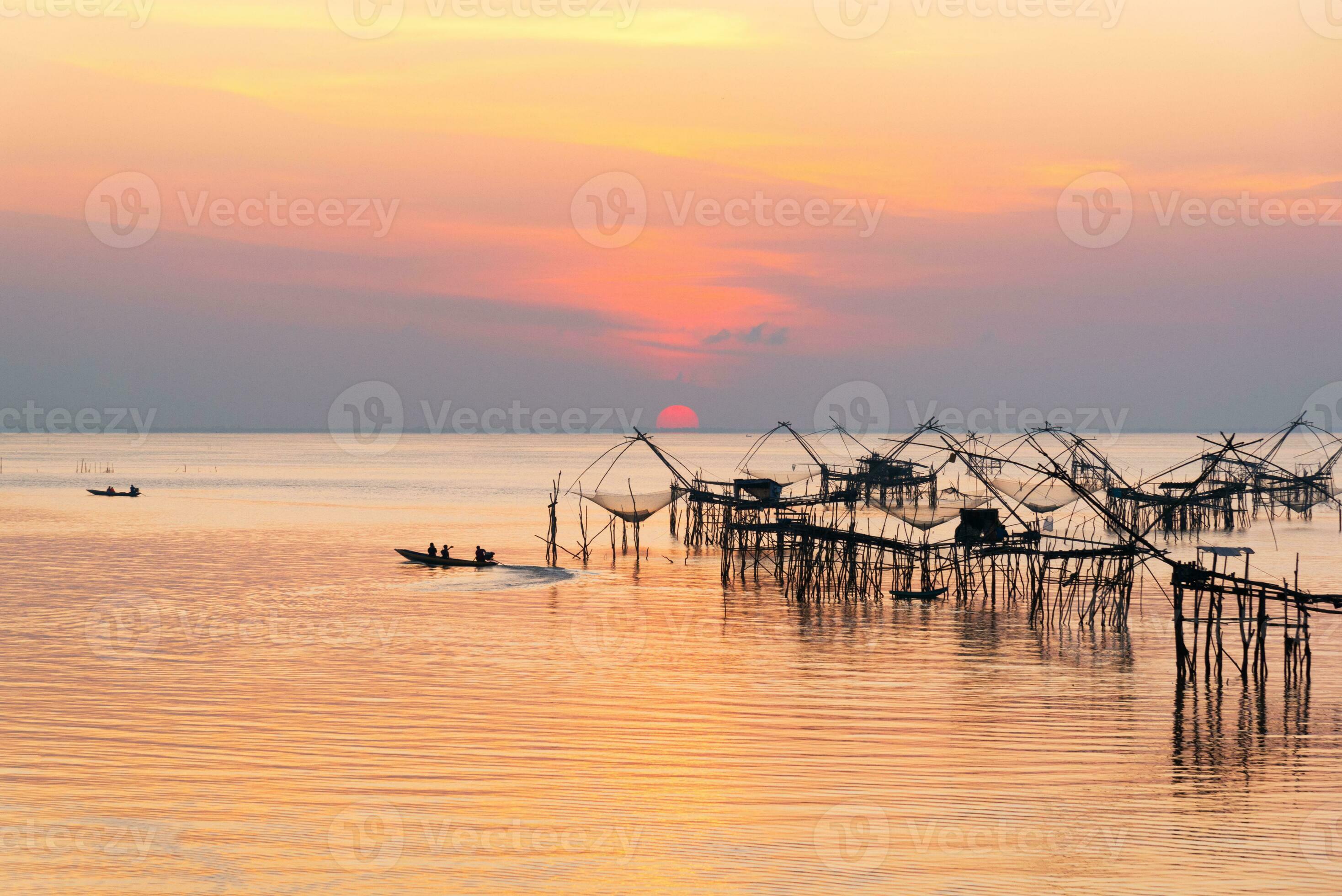 Scene of sunrise and tourist visiting giant fishing net 22525903 Stock  Photo at Vecteezy