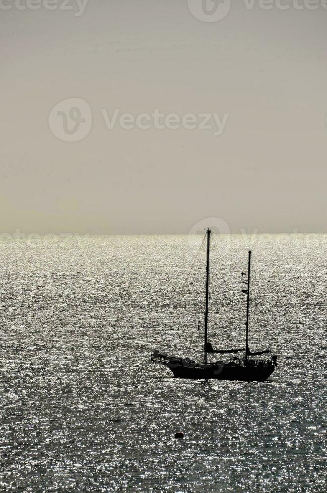 Boat on the ocean photo