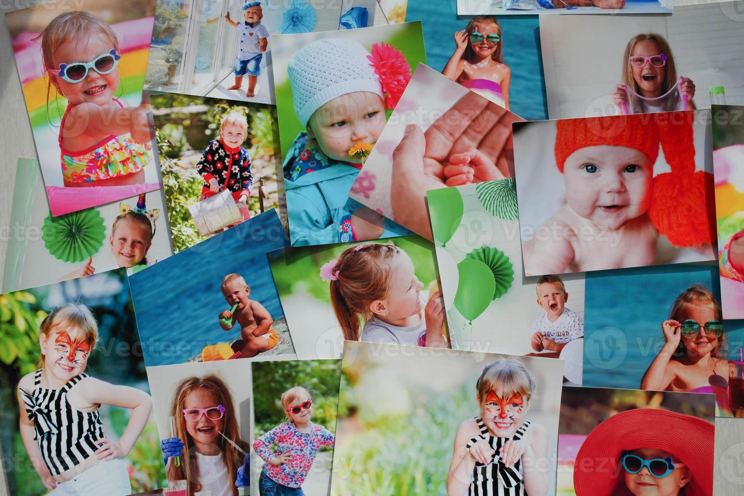 Printed photographs of children. A huge amount of printed materials. photo