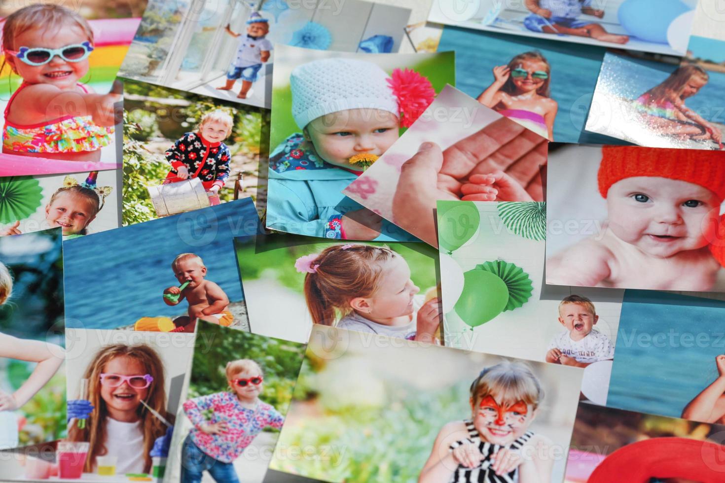 Printed photographs of children. A huge amount of printed materials. photo