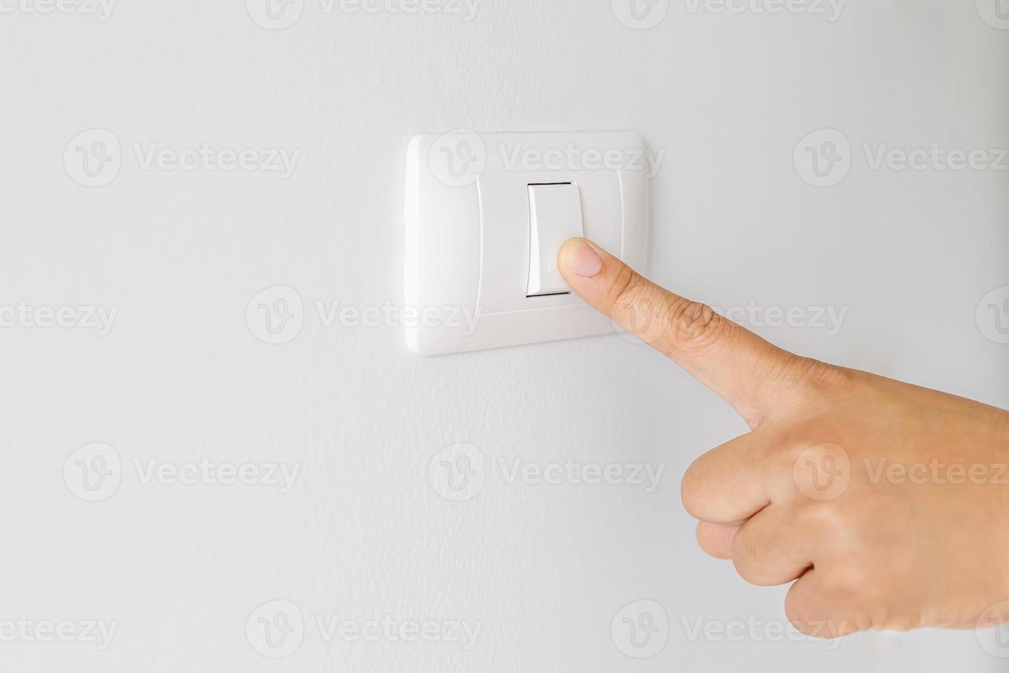 Turn off the power switch to save electricity in the house. photo